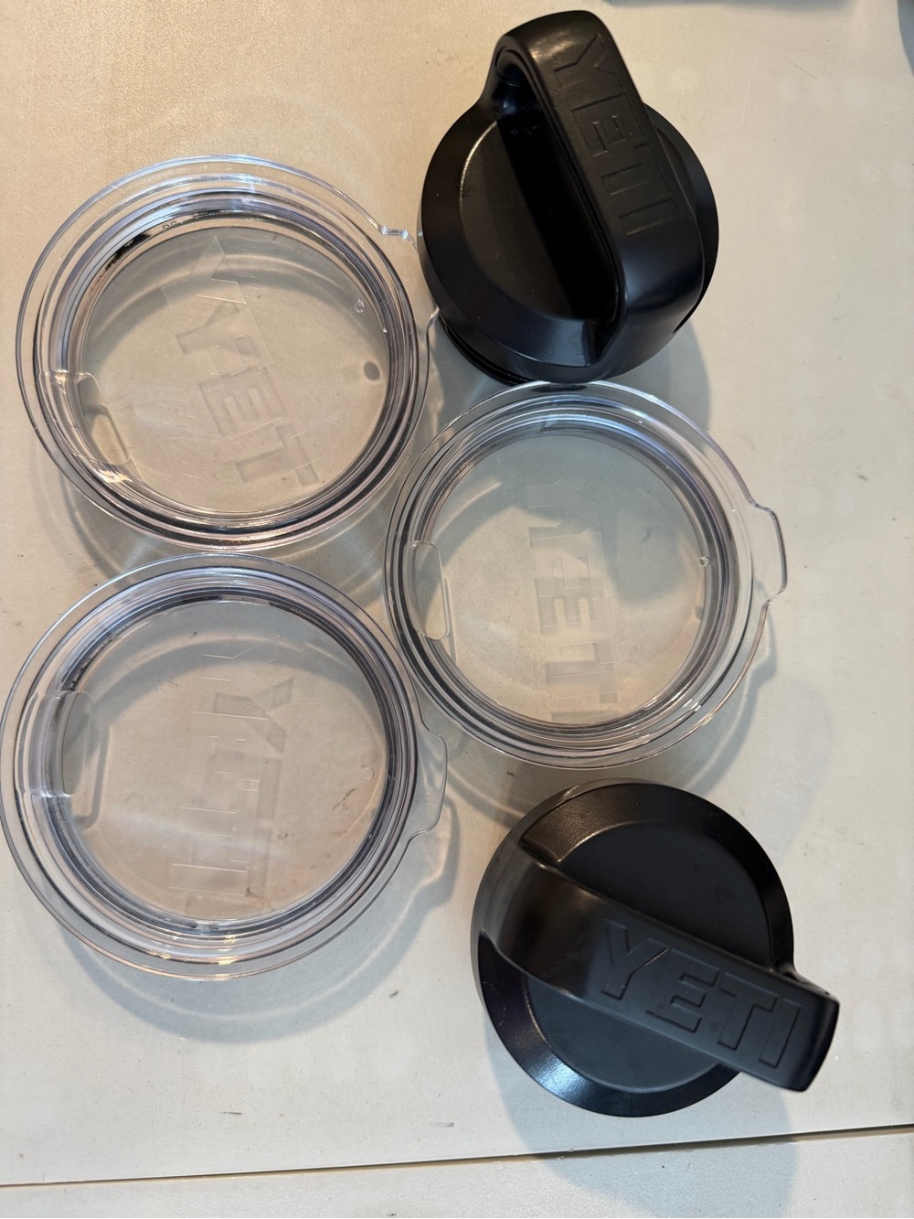 Yeti Clear Lids with Black YETI Rambler bottle Caps